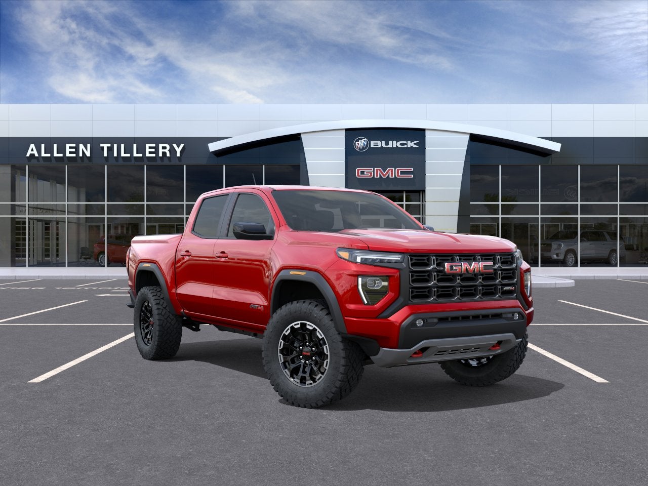 2026 GMC Canyon AT4 in Volcanic Red Tintcoat — front three-quarter view